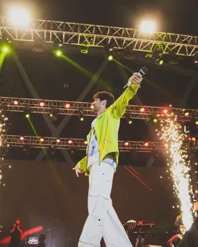 Armaan Mailk in Nirmooha's Lime Green Jacket with Belt from Magical Wilderness Collection