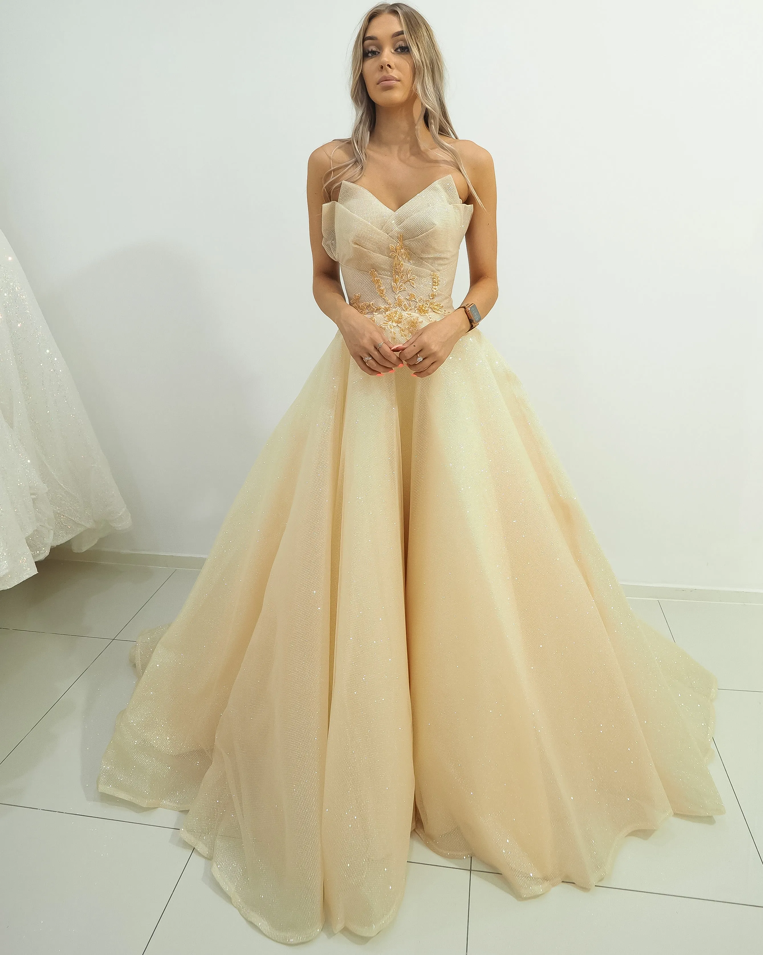 Strapless sparkling light gold tulle princess dress for hire